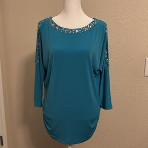 Teal top with sparkles